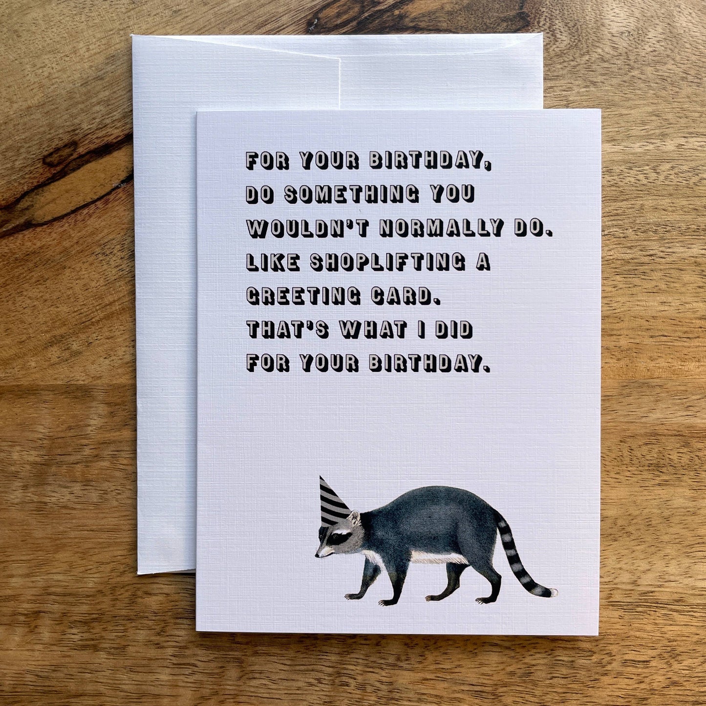 Racoon shoplifting funny animal birthday greeting card